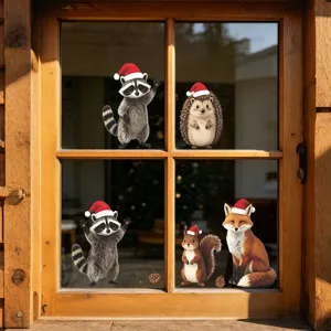Festive Christmas woodland animal window stickers featuring Santa hat raccoon and fox decals