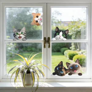Detail view showing various cartoon peeking cat stickers applied on a white window frame