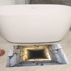 Realistic 3D rock tunnel floor sticker creating a deep hole effect in bathroom scene