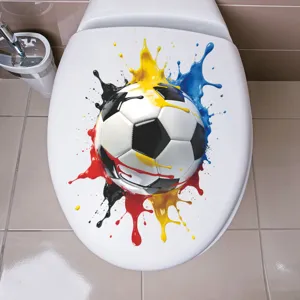 Adesivo da calcio 3D con vivaci schizzi di colore applicato su una superficie bianca