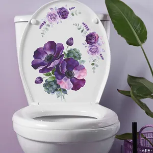 Close-up detail of purple anemone and lavender floral decal applied to a white toilet lid