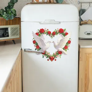 Heart-shaped dove and rose floral sticker shown as a decorative decal on a white refrigerator.