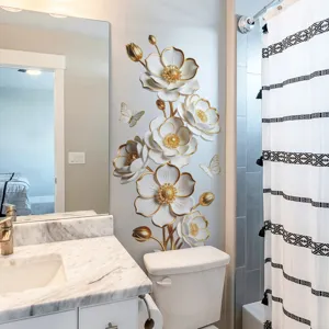 Detailed view of 3D white and gold floral wall sticker in a modern bathroom.