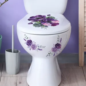 Detail of decorative purple floral anemone and rose decals on a white toilet bowl