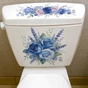 Elegant blue roses and lavender floral decals applied to a white ceramic toilet tank