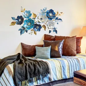 Blue enamel metal flower wall art decoration displayed over a bed in a bedroom