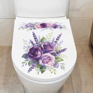 Detail view of watercolor purple rose and lavender sticker on white toilet lid.