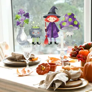 Cute cartoon Halloween little witch and mushroom window decals applied to a glass pane