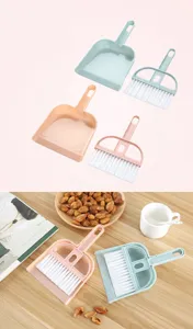 Mini bureau blik en veger set voor het reinigen van toetsenborden en kleine kantoorruimtes.