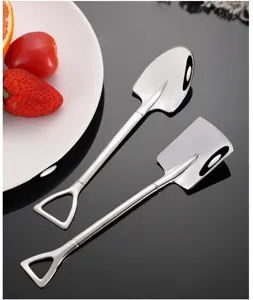 Stainless steel shovel spoon detail shot showing creative dessert and fruit cutlery design clearly.