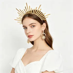Detailed shot of a golden Mary halo headband and matching sun goddess starburst earrings