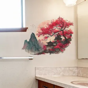 Detailed view of a Chinese landscape wall sticker featuring red trees on a bathroom wall
