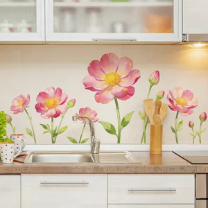 Close-up detail of gradient pink poppy floral wall stickers applied to kitchen backsplash