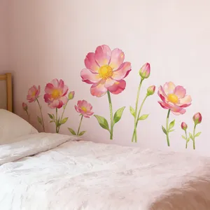 Detail view of pink gradient poppy floral wall decals decorating a soft bedroom wall