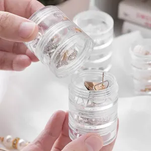 Boîte de rangement de bijoux mini transparente multicouche portable pour bagues et boucles.