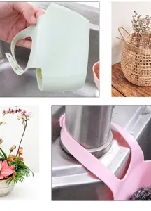 Silicone sink hanging basket detail shot, adjustable snap strap for kitchen faucet and sponge.