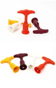 Detail view of colorful plastic wine corkscrews, portable kitchen bottle opener tools.
