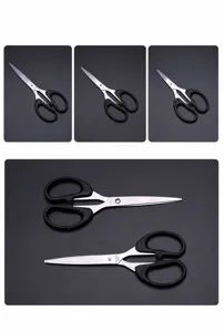 Durable stainless steel household office scissors with ergonomic handle for paper cutting.