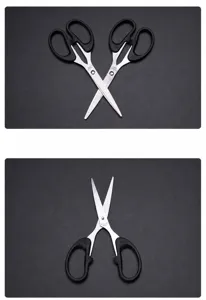 Stainless steel office and home scissors with ergonomic black plastic handles detail view.