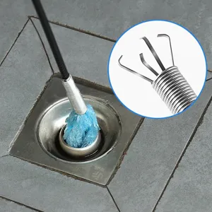 Flexible drain clog remover tool with four claws grabber for kitchen sewer pipe cleaning.