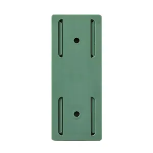 Green self-adhesive power strip wall mount holder, punch-free socket fixer bracket for home office.