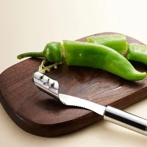 Stainless steel pepper corer tool for kitchen, featuring a jagged edge to remove seeds easily.
