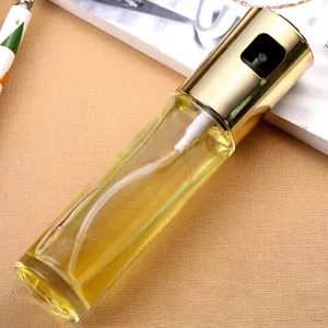 Kitchen oil sprayer bottle with gold pump, glass olive oil dispenser for cooking and BBQ use.