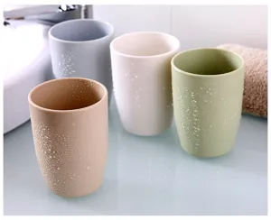 Creative plastic mouthwash cups set, minimalist toothbrush holders for family daily use bathroom.