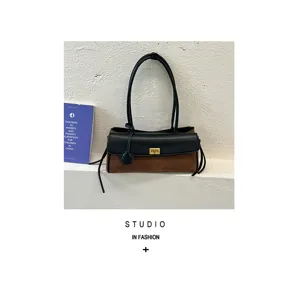 Korean style brown and black diamond quilted baguette bag with golden lock closure