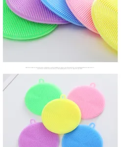 Detailed view of colorful silicone cleaning brushes with soft bristles and hanging loops.