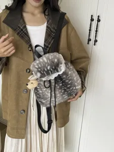 Cute grey spotted faux fur backpack with delicate white lace trim and bear charm
