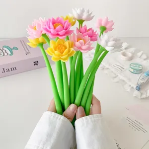 Close-up of colorful silicone lotus flower gel pens held in hands for student gift.
