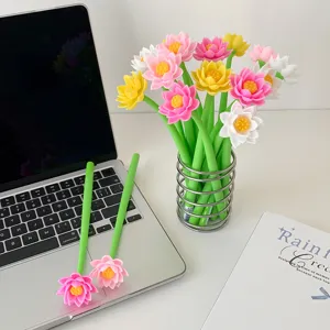 Creative lotus flower silicone gel pens in a spiral holder on a modern office desk