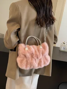 Sweet pink furry handbag with rhinestone handle and pearl accents, stylish autumn accessory