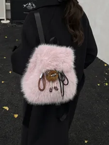 Weicher rosa Kunstpelz-Rucksack für Damen mit einem süßen flauschigen Plüschmonster