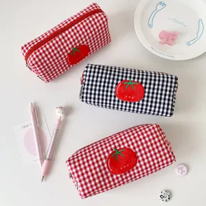 Selection of red and black gingham pencil cases with detailed tomato embroidery
