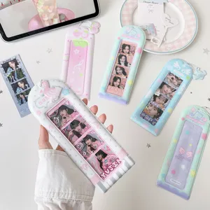 Detailed macro shot of various pastel PVC 4-frame photostrip holders for collectors