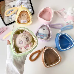 Detailed macro shot of colorful plush doll display bags with clear PVC windows for storage