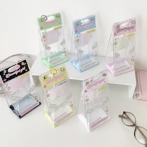 Transparent PVC display bags with angel wings for 10cm dolls in various pastel colors