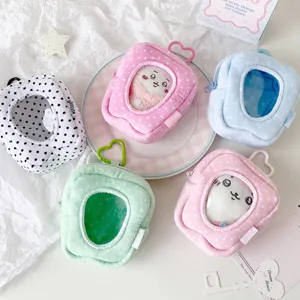 Close-up of plush doll carry cases in various colors with transparent display windows