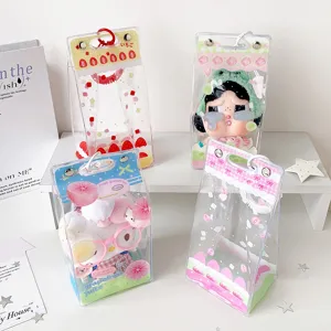 Detailed view of transparent PVC doll display bags with cute cake and fruit patterns