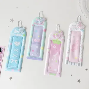 Detailed view of four cute PVC photocard holders with heart and music patterns in pastel