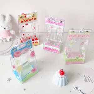 Set of transparent PVC doll display bags featuring cute fruit and bow patterns for storage