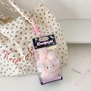 Detailed view of clear PVC display bag for 10cm plush doll with pink bunny and wings