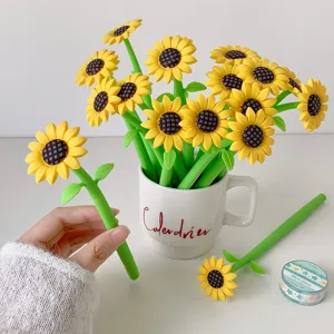 Detailed view of creative sunflower silicone gel pens placed in a white ceramic mug