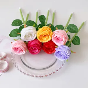 Creative ballpoint pens featuring realistic artificial rose heads in assorted vibrant colors