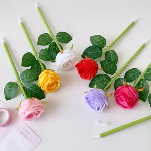 Detailed view of realistic artificial rose ballpoint pens in multiple colors like red and pink