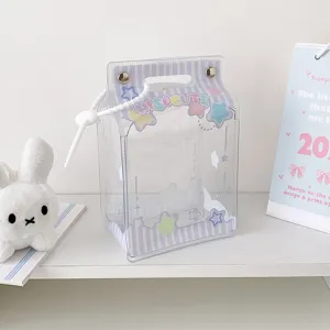 Close-up of kawaii milk carton shaped transparent PVC bag for plush doll display and storage