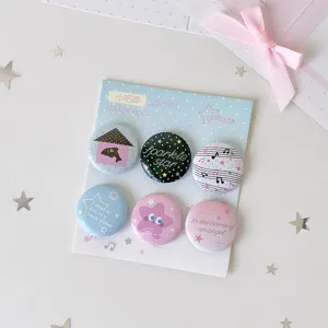 Detailed view of 6-piece set of cute 25mm cartoon star and musical note themed badges