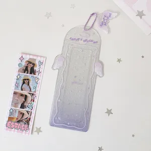 Detail of purple gradient angel wings acrylic photo card holder with sparkle effect